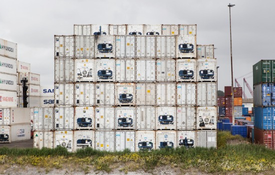 Refrigerated Containers for St. Louis MO Stacked on Top of Each Other in a Shipping Yard