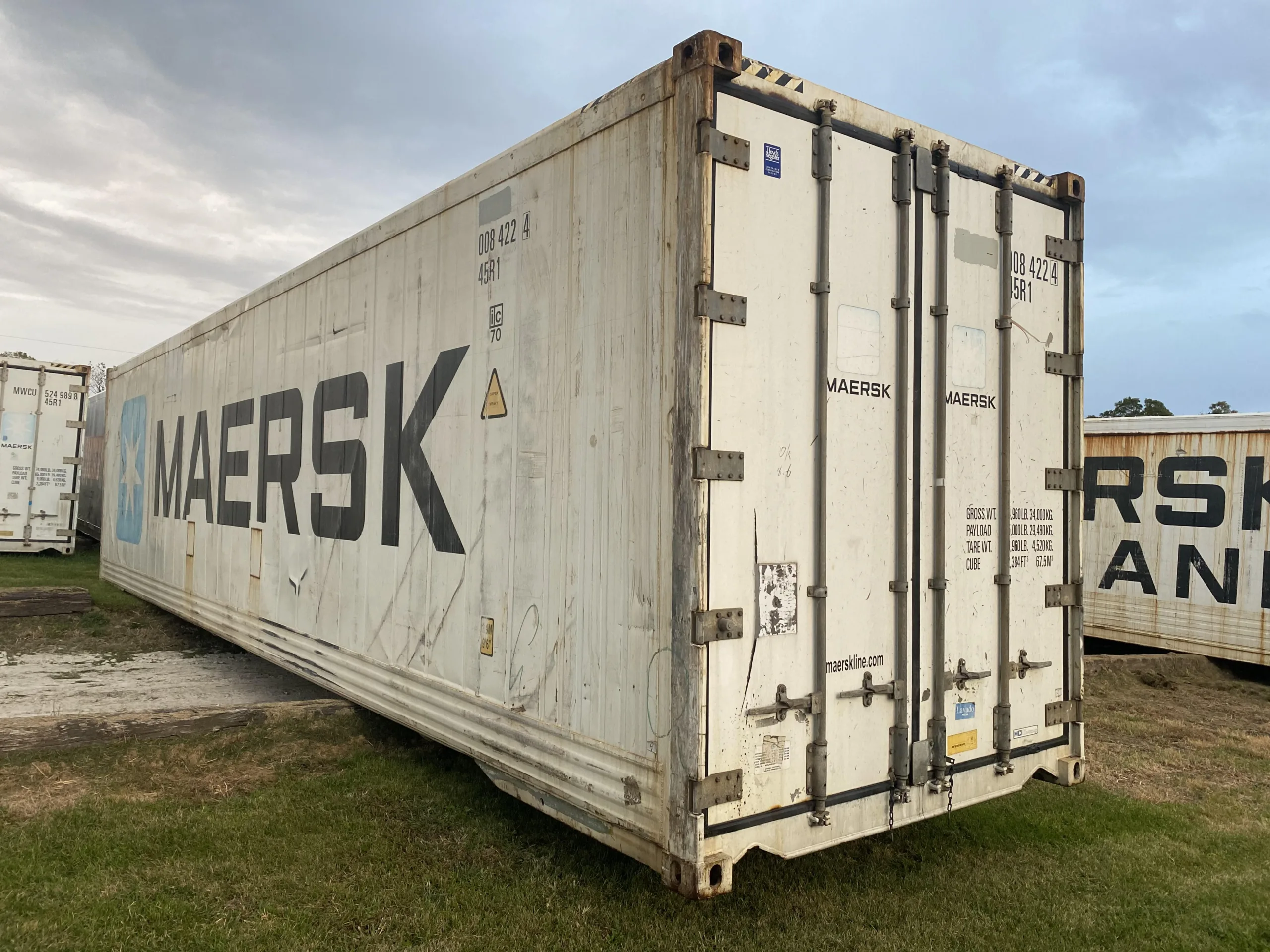 A large dry shipping container, without the refrigeration capabilities of a reefer container