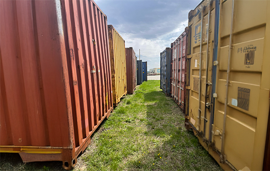 A row of shipping containers ready to be sold in Iowa